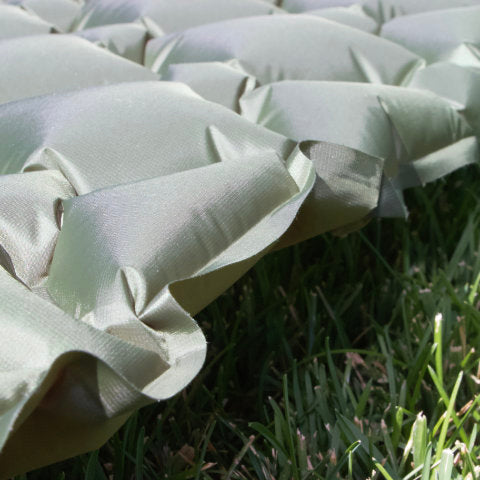 Detail view showing the hammock friendly, soft edges of the Junco Sleeping Pad