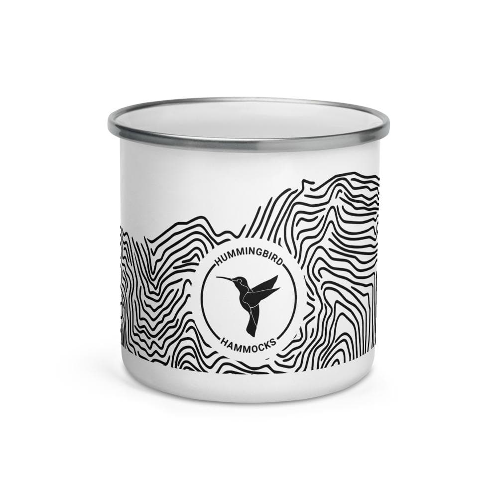 White Topo Enamel Camper Mug with a black and white logo featuring a hummingbird and the text "Hummingbird Hammocks" surrounded by wavy lines.
